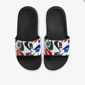 Brand new kids Nike slides
